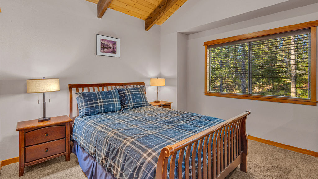 Upstairs primary suite with king bed